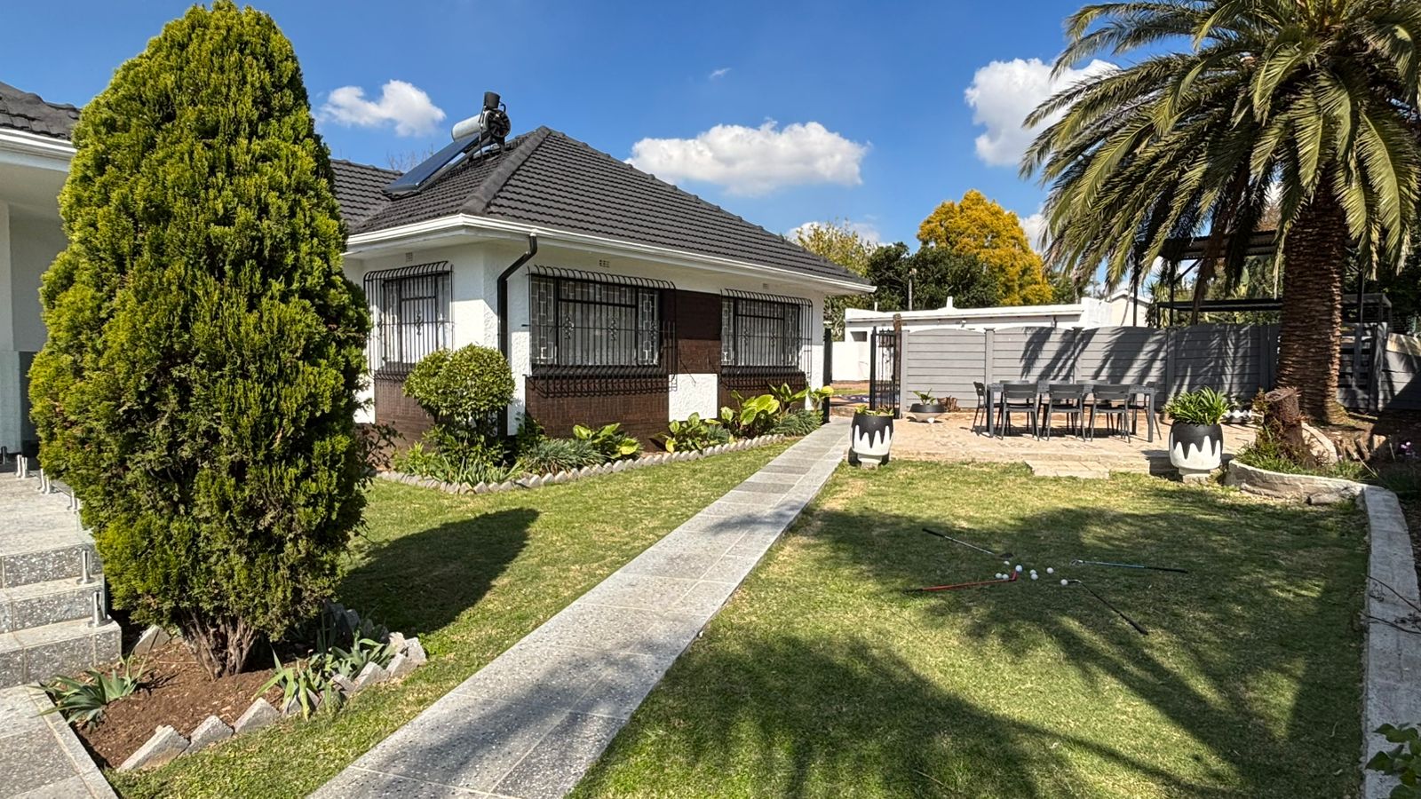 Side exterior walkway and house entrance