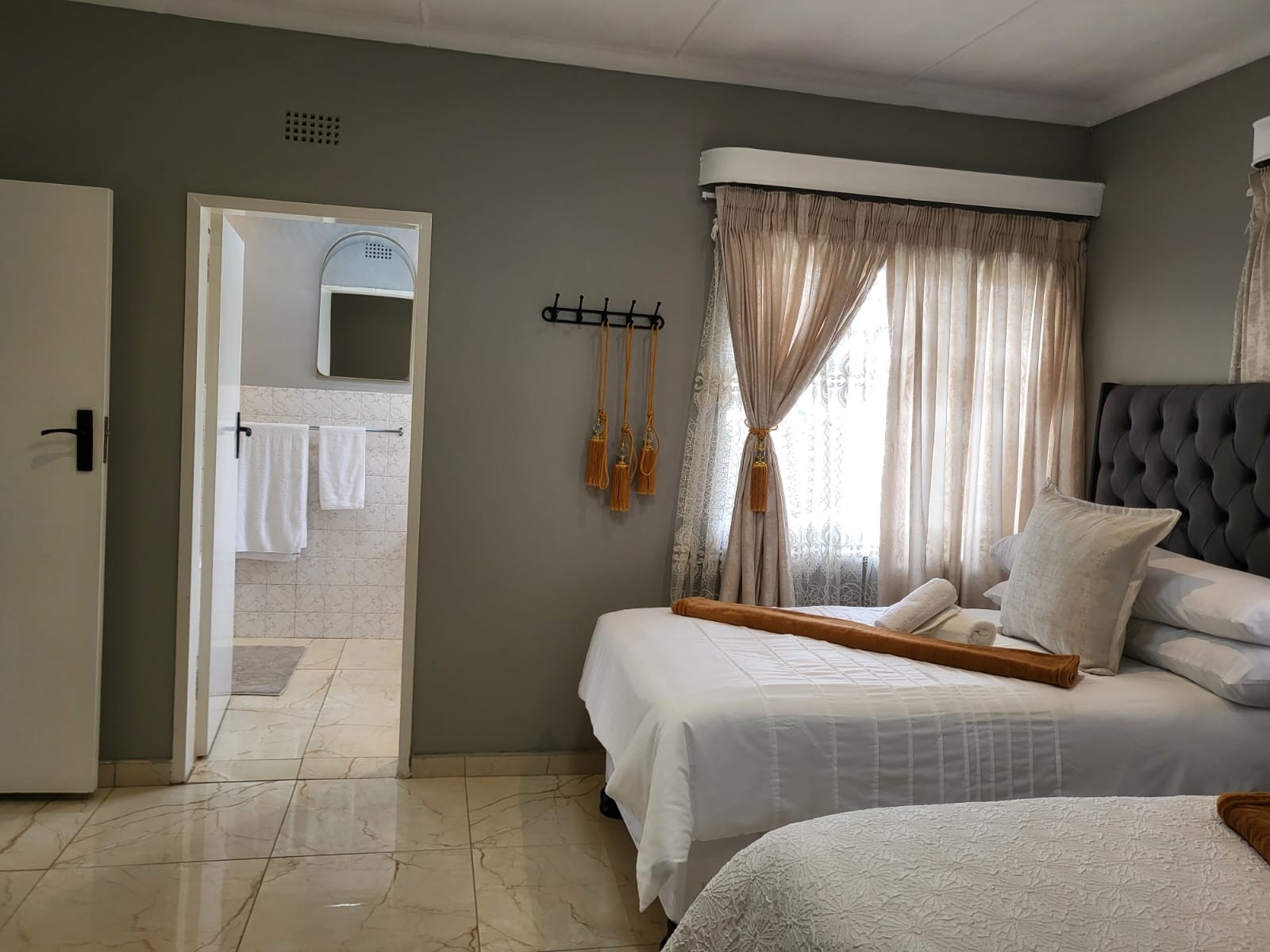 Room 1 with its private en suite bathroom