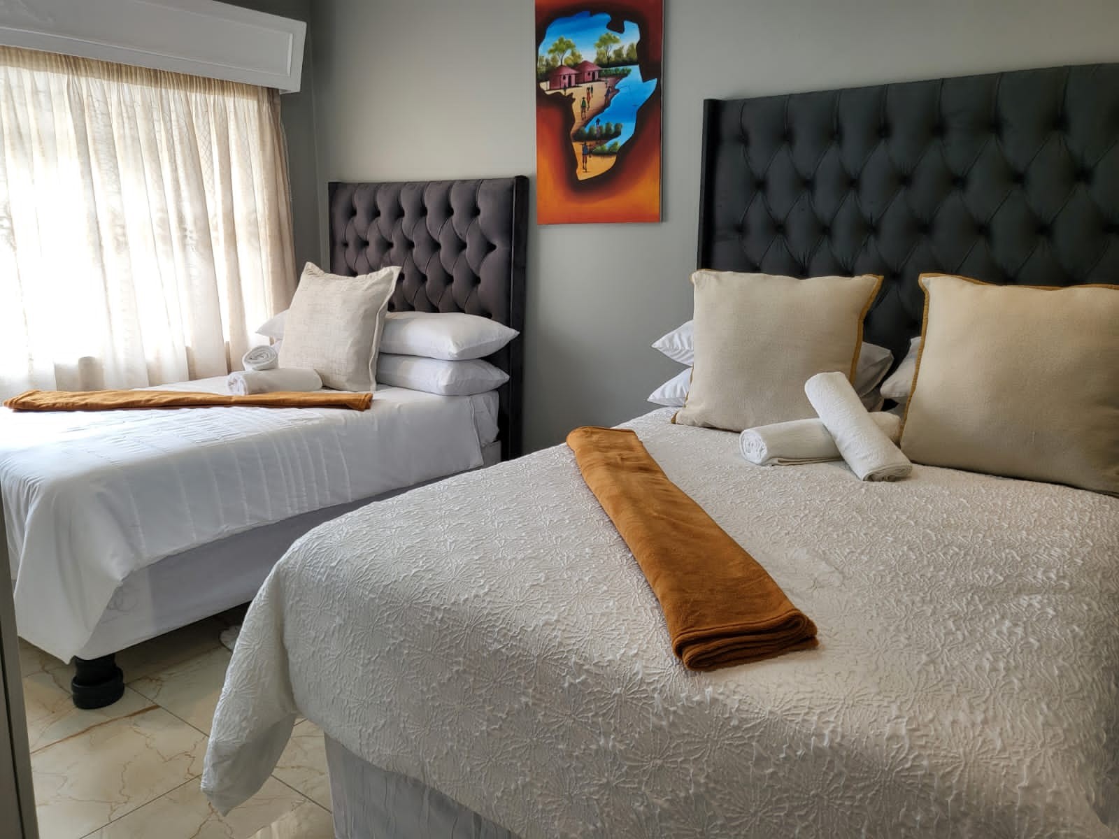 Room 4 with a double bed and single bed